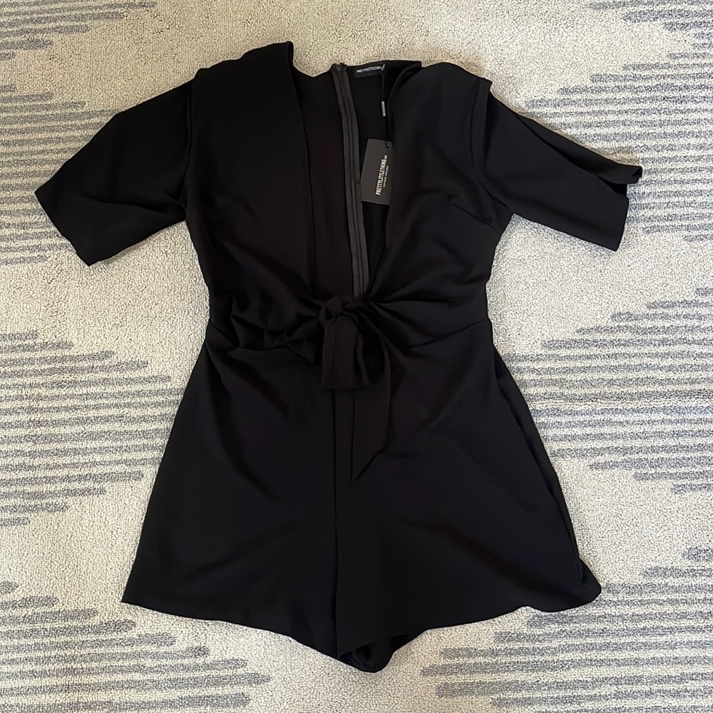 PRETTY LITTLE THING LOW CUT BLACK ROMPER